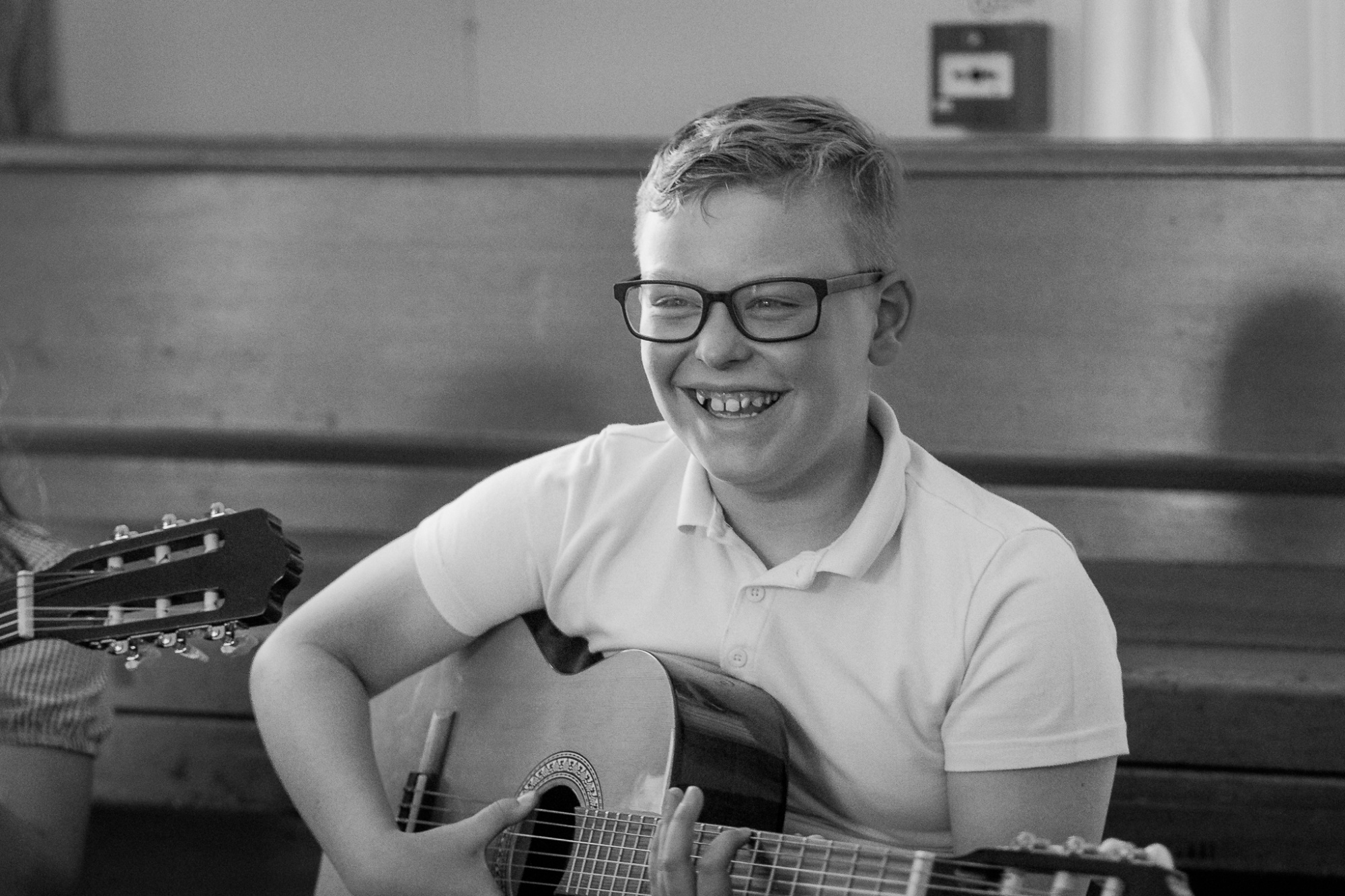 student playing guitar