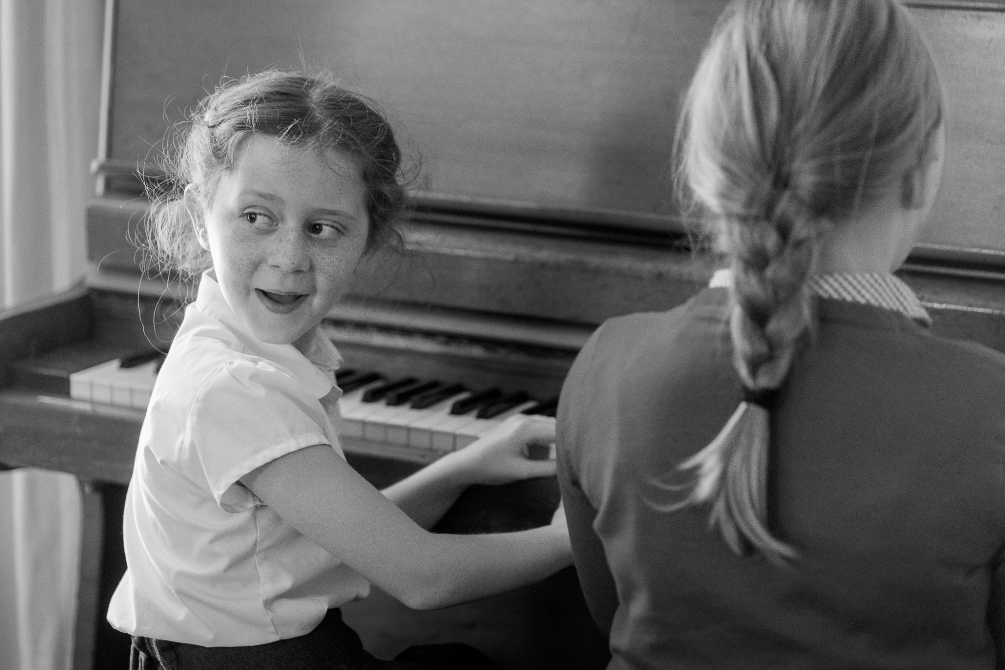 child playing piano