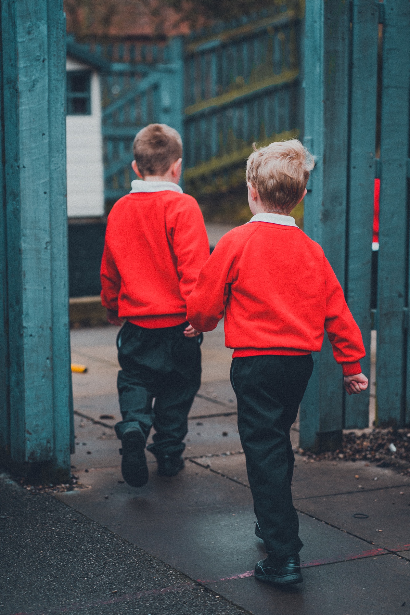 two students in outdoor school area